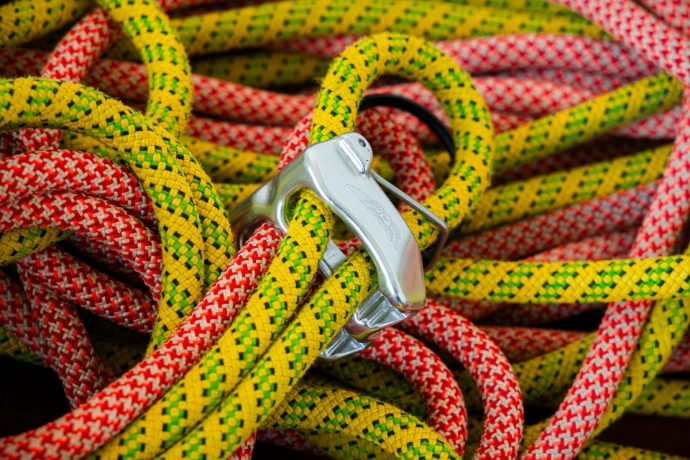 yellow and red rope on silver belt buckle